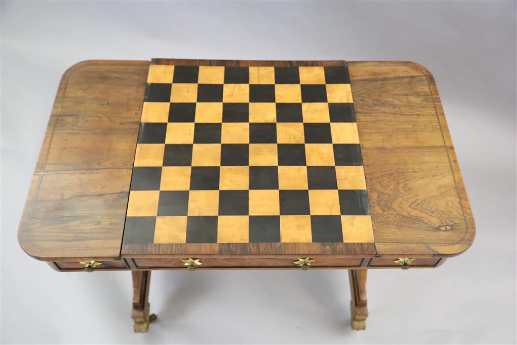 A Regency brass strung rosewood games table, W.3ft D.1ft 9in. H.2ft 5in.